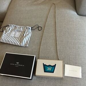 Anya Hindmarch White Clutch with Blue Icon and Chain